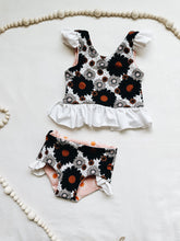 Load image into Gallery viewer, Black and white polka dot floral ruffle reversible swim suit
